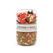 Reindeer sensory dough jar with brown holiday dough and a clear top compartment filled with festive trinkets by Young Wild and Friedman