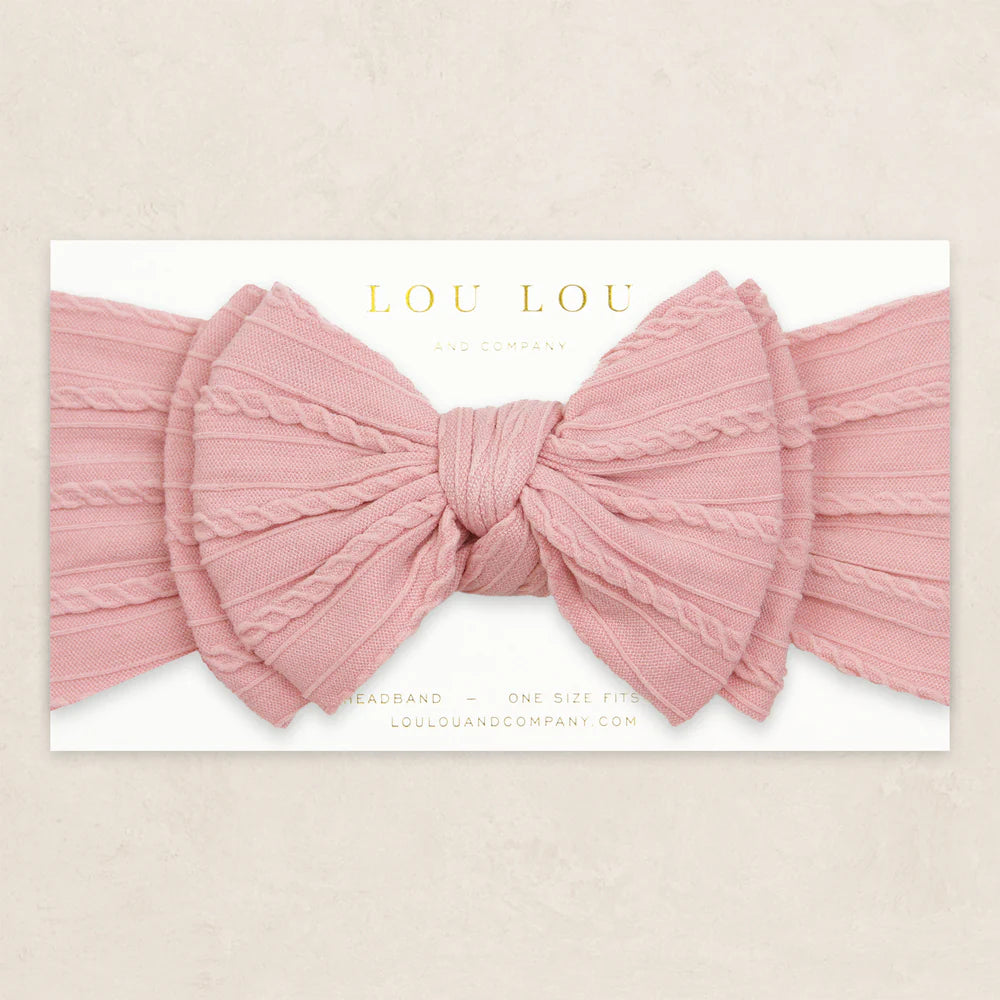 Rose colored cable knit headband