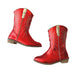 Pair of red cowboy boots with gold accents on a white background