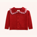 A red knit cardigan sweater for toddlers, featuring a soft pink fuzzy ruffled collar and matching red buttons down the front, displayed on a clean off-white background.