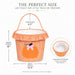 A gingham orange and white pumpkin treat basket with a printed orange pumpkin and pink bow on the front, shown with measurement callouts for height, width, and handle drop, plus a circular inset showing the spacious interior.