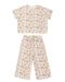 Bow and floral patterned top and pants set on a white background