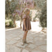 girl wearing plum floral puff sleeved babydoll dress