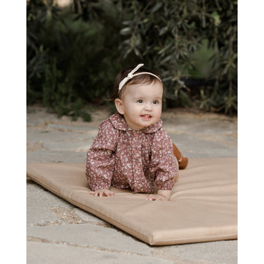 baby girl wearing plum floral collared button down top with matching bloomer