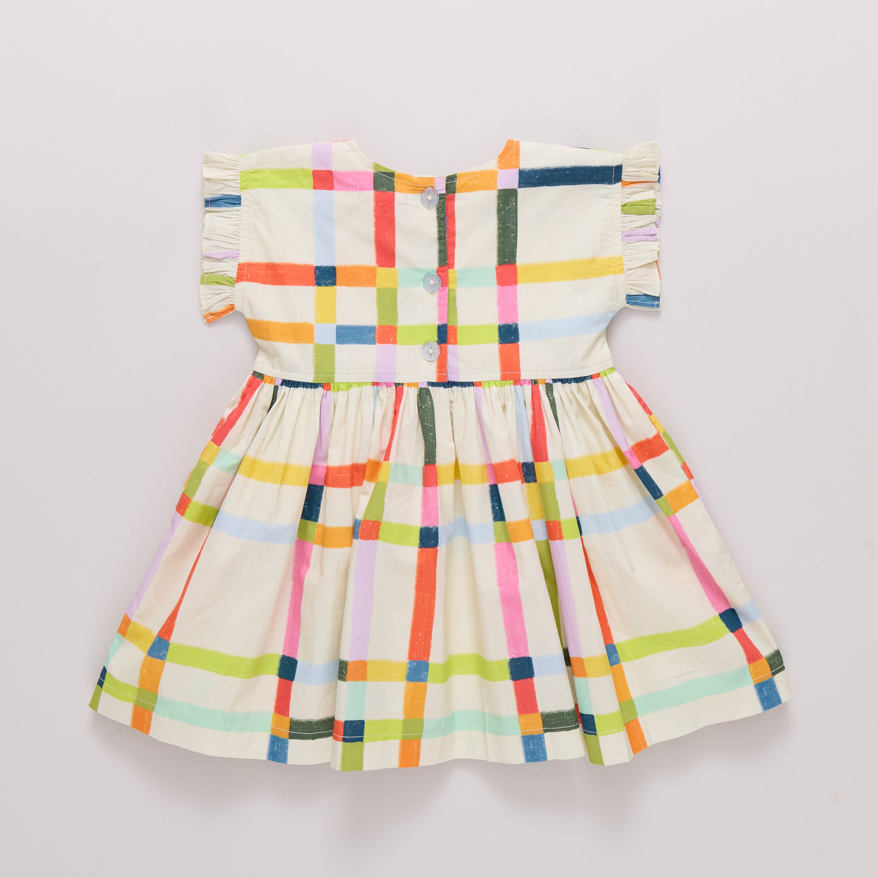 Colorful plaid dress on a light gray background