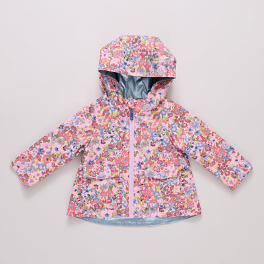 Floral patterned raincoat on a light gray background