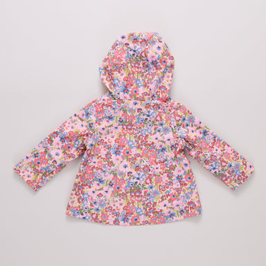 Floral-patterned children's raincoat on a light gray background