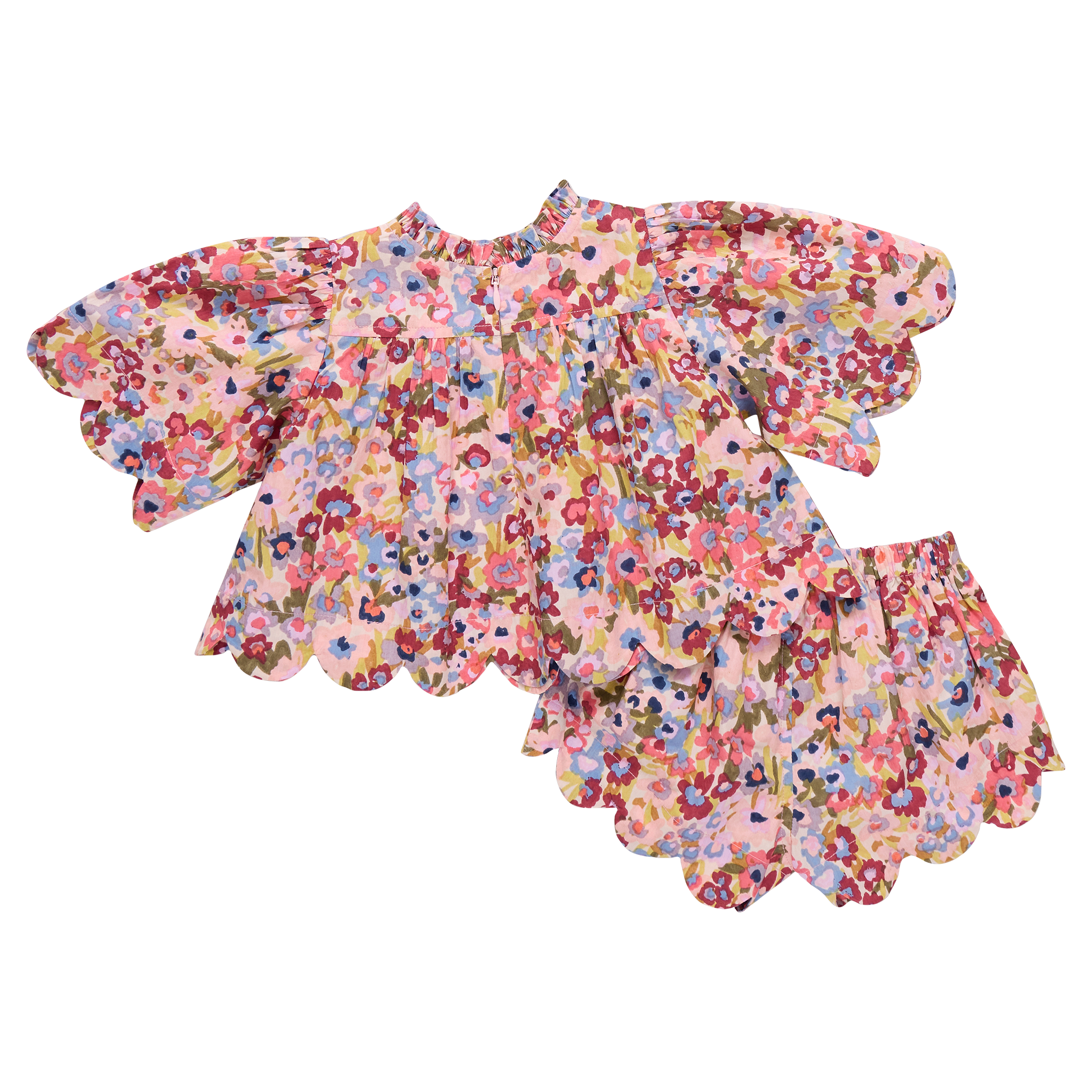 Floral top with baby shorts on a white background