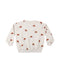 A cream-colored long-sleeve sweatshirt featuring an all-over print of Santa Claus faces wearing red Santa hats, displayed against a solid white background.
