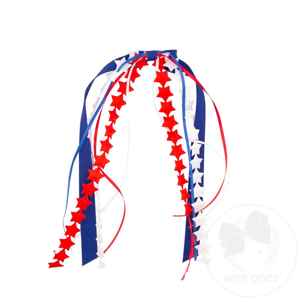 Red, white, and blue hair bow with star patterns on a white background