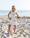White crochet dress with gold sequin stars