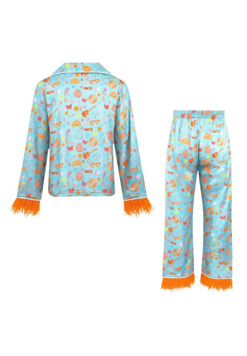 A two-piece pajama set featuring a long-sleeve button-up shirt and matching pants in light blue satin with a colorful pattern of sunglasses, guitars, and flowers, finished with bright orange fringe trim at the cuffs and hem.