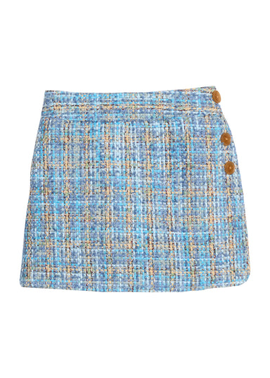 Blue plaid  skort with brown buttons on a white background