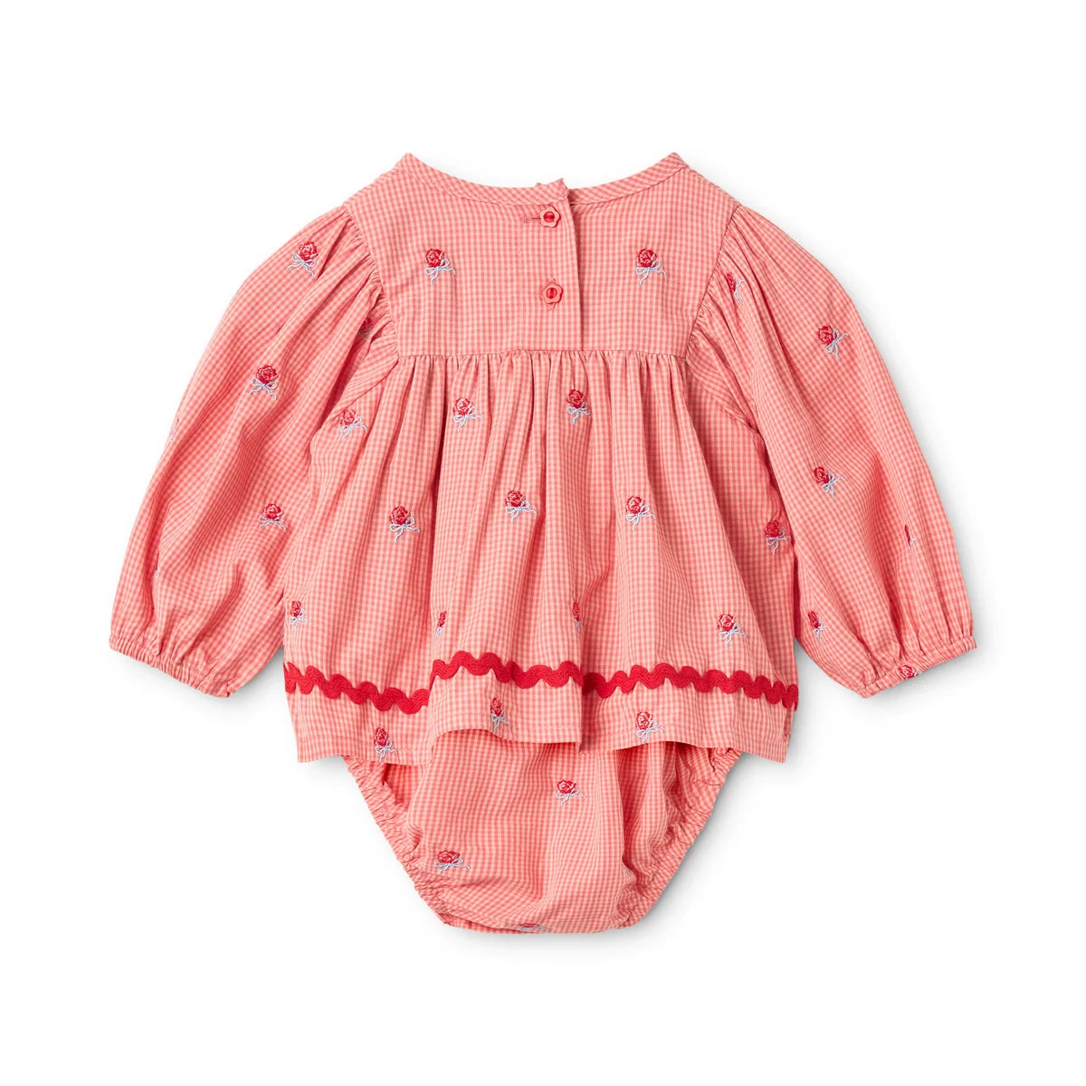 A baby girl's long-sleeve romper in a pink and white gingham check pattern, decorated with small embroidered strawberries and a red wavy hem trim, shown flat on a white background.