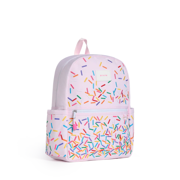 Side view of pink Sprinkles Kane Backpack