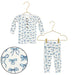 Children's long-sleeve shirt and pants with blue bow pattern on hangers against a white background.