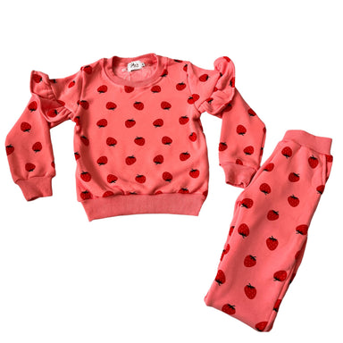 pink long sleeve sweatshirt and matching joggers with strawberry print and ruffle detail on sleeves