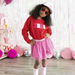 girl wearing pink tutu with chenille heart patches