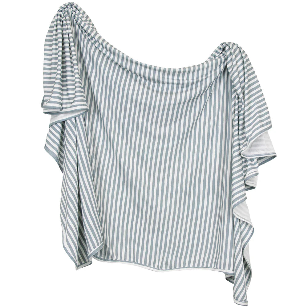 Grey and white striped blanket on a white background