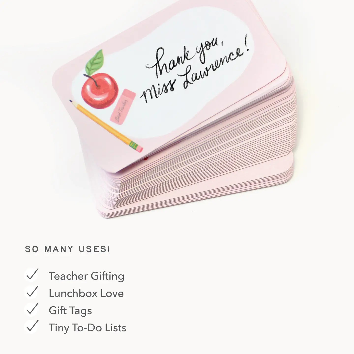 Stack of pink cards with a teacher-themed design on a white background