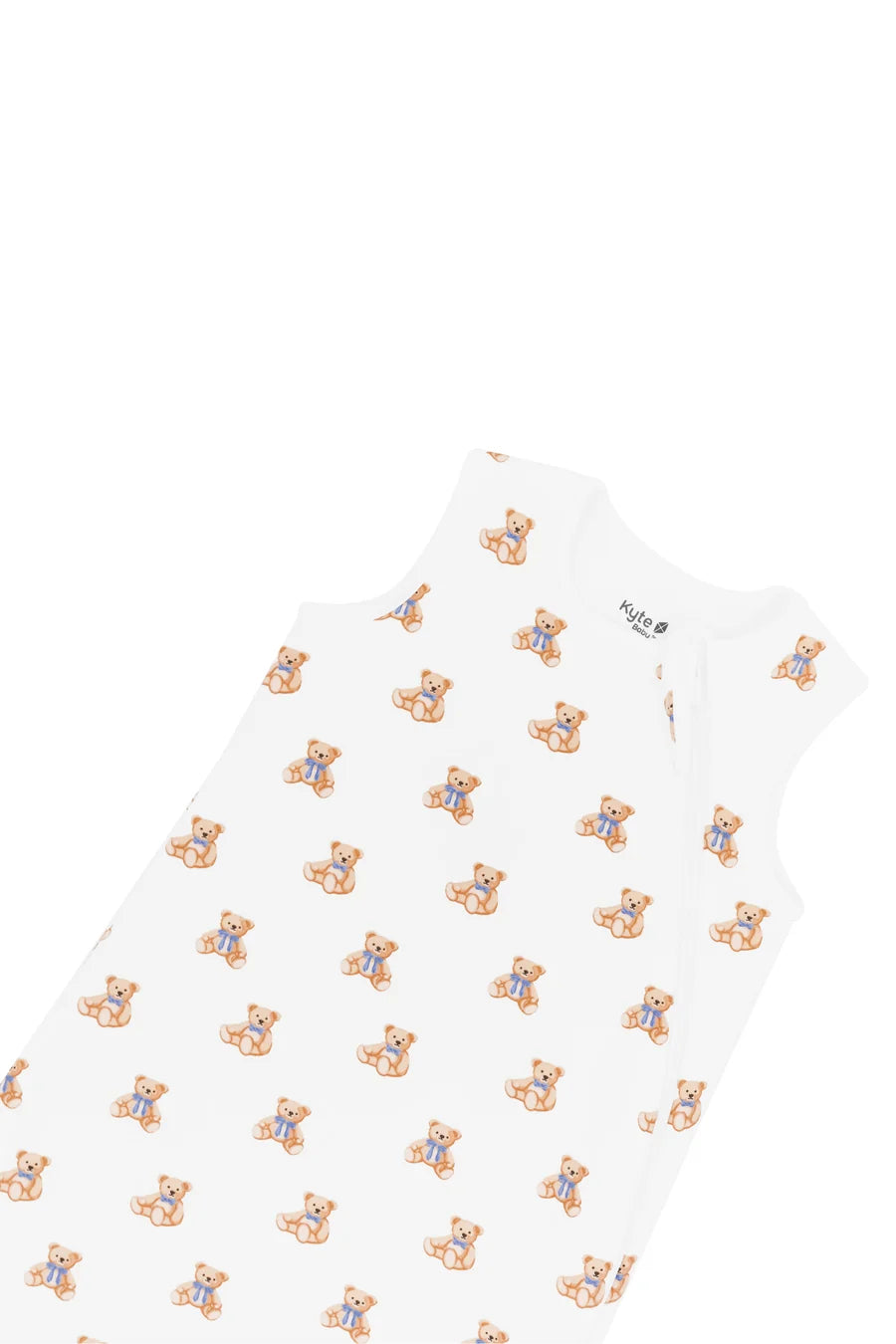 A white sleeveless baby sleep sack featuring a repeating pattern of small teddy bears wearing blue outfits, shown on a plain white background.