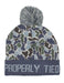 Camouflage patterned beanie with pom-pom and 'Properly Tied' text on a white background