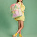 Girl carrying a Tie Dye Kane Double Pocket Backpack