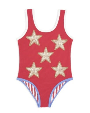Red swimsuit with gold star designs on a white background