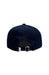 Navy blue cap with a metal clasp on a white background