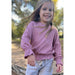 little girl wearing rose colored tee with elastic at waist and wrists