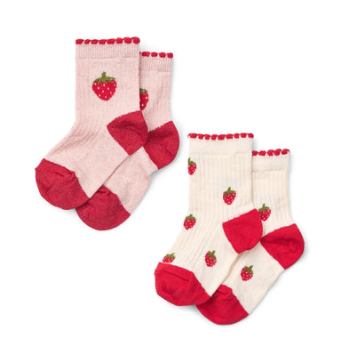 Two pairs of children's socks on a white background. One pair is light pink with red toes, heels, and cuffs, decorated with embroidered red strawberries.