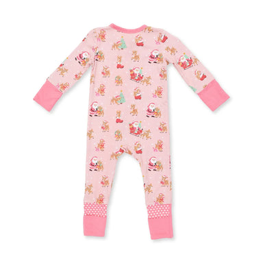 A baby's long-sleeve footless pajama romper in light pink, featuring an all-over print of Santa Claus and reindeer, with solid pink cuffs and leg cuffs.