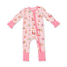 A pink long-sleeve baby footed one-piece sleeper with a front zipper, featuring an all-over print of Santa Claus and reindeer, on a white background.
