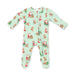 A baby long-sleeve footed sleeper in mint green with a festive Christmas print of Santa Claus and reindeer, laid flat on a white background.