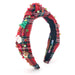 red tartan plaid knotted headband with tree, Santa, and a reindeer charm per side