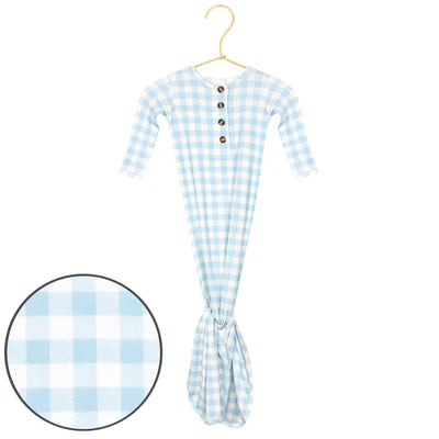 Blue and white checkered knotted gown on a hanger with a close-up inset showing fabric texture.