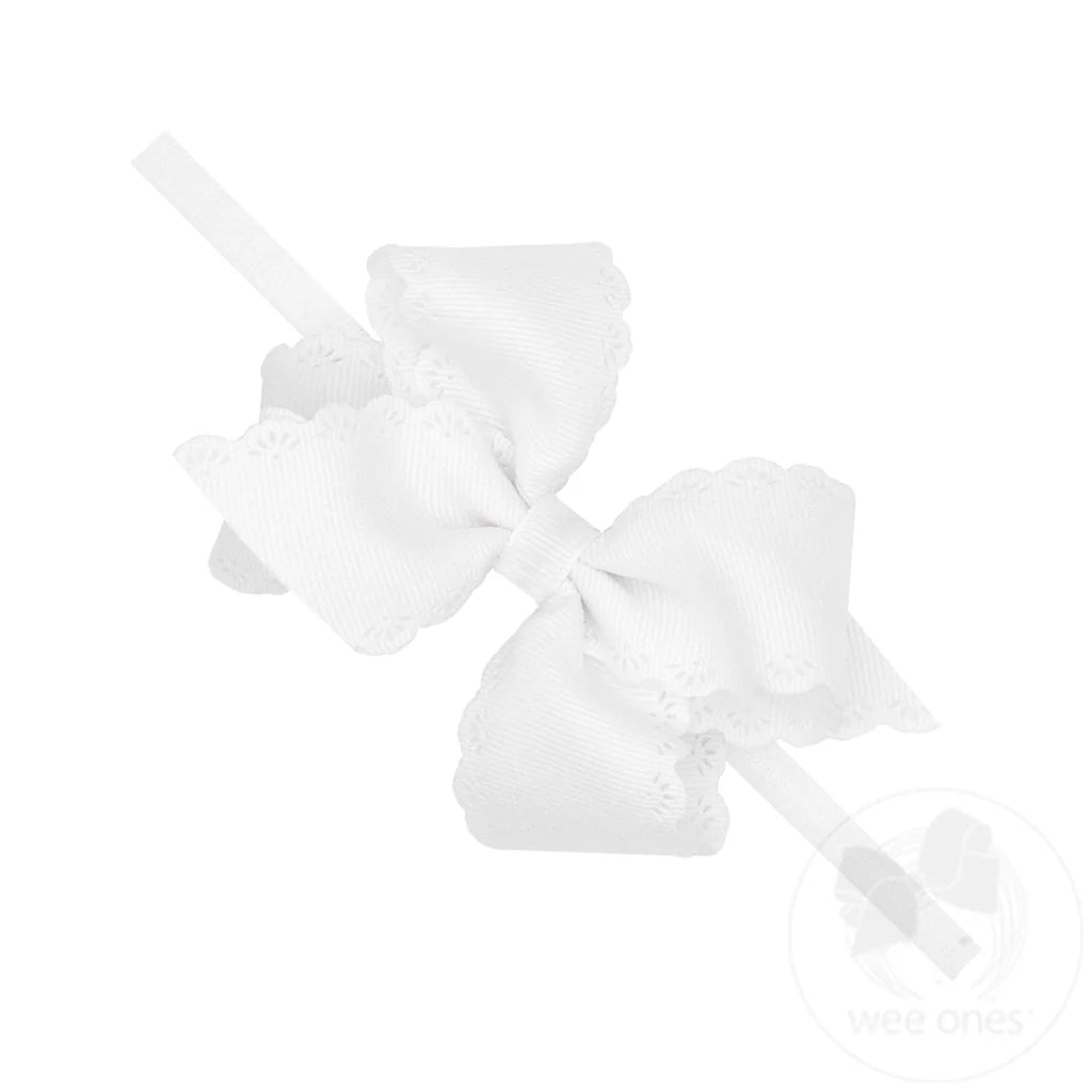 White  bow headband on a white background