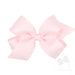 Large pink bow on a white background
