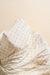 Floral patterned fabric on a beige background