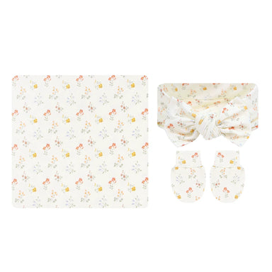 A baby gift set featuring a square blanket, a knotted headband, and a pair of mittens, all in a soft cream color with a delicate multicolor floral pattern.