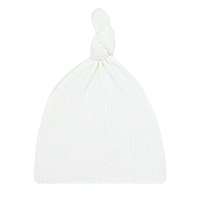 A white ribbed cotton baby beanie hat with a knotted top, shown on a plain white background.