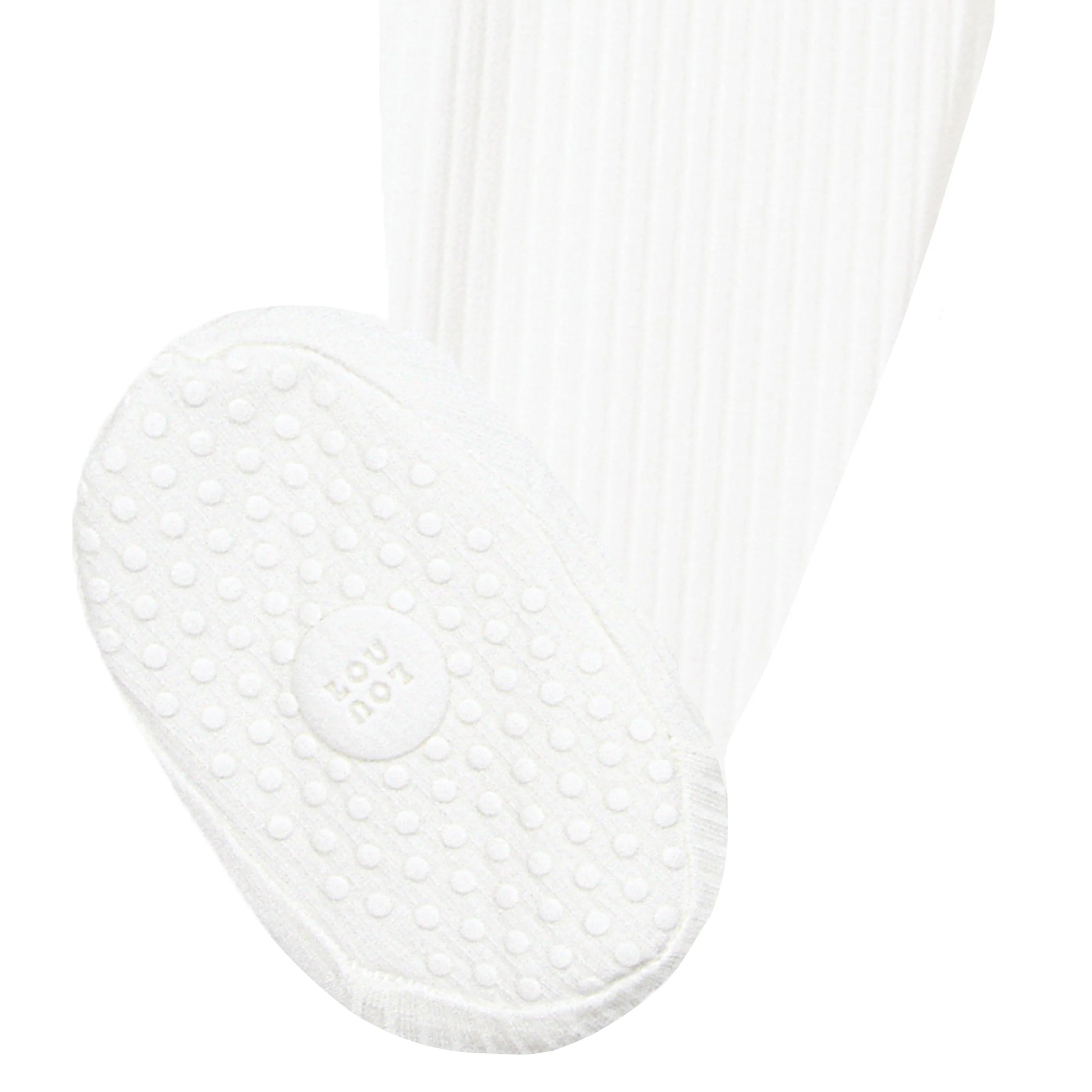 White leg of pajamas with textured sole on a white background