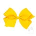 Yellow hair bow on a white background