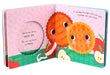 Children's book with two orange characters and a pink background