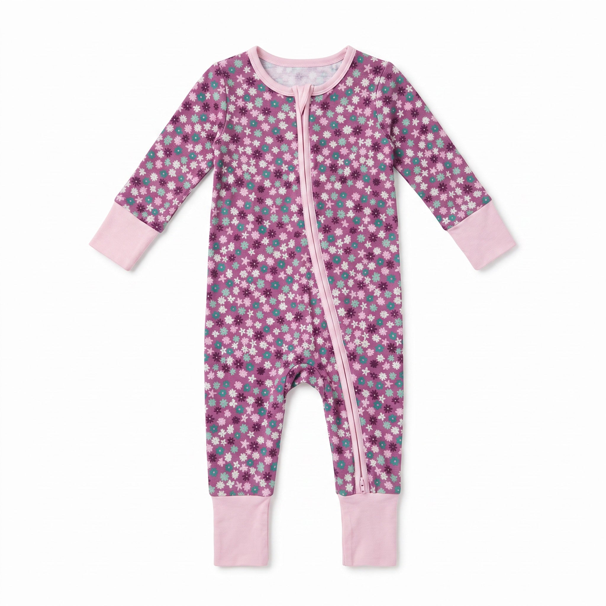A baby long-sleeve footless one-piece sleeper with a pink, purple, and teal floral pattern, featuring light pink cuffs and a light pink front zipper.