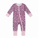 A baby long-sleeve footless one-piece sleeper with a pink, purple, and teal floral pattern, featuring light pink cuffs and a light pink front zipper.