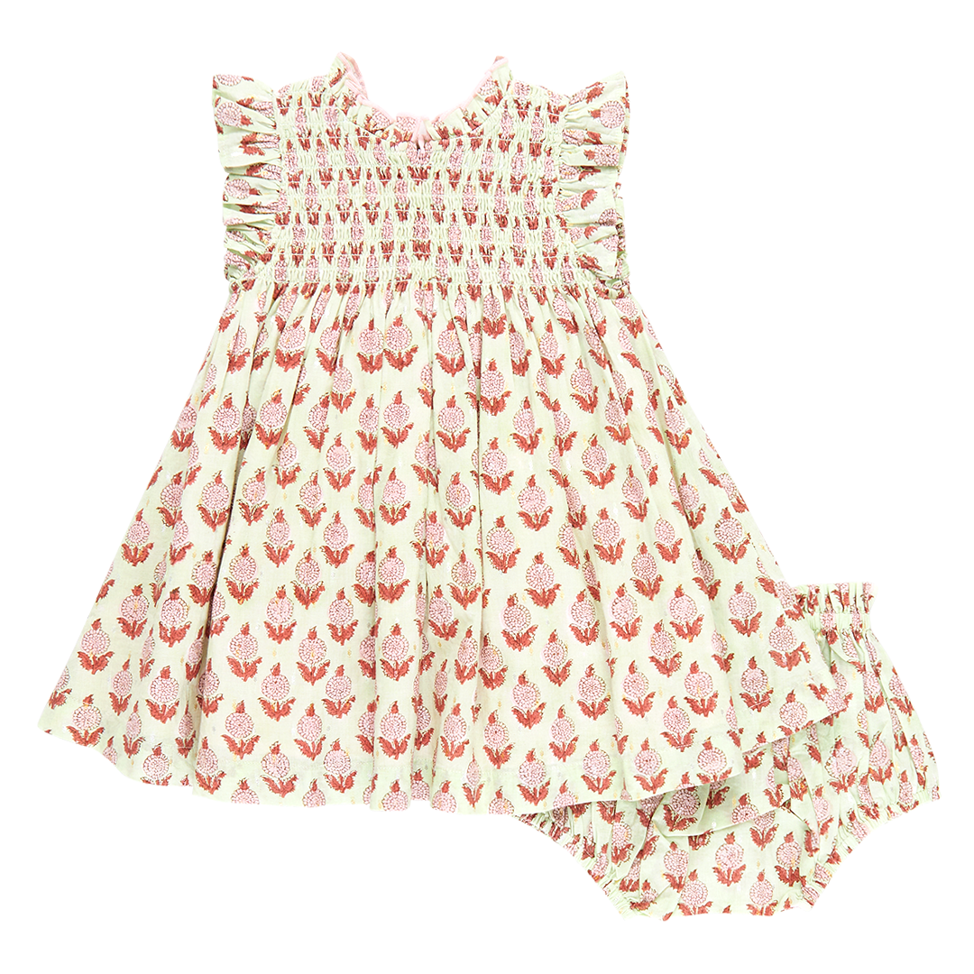 light green sleeveless smocked ruffle dress with pink and red block print with matching bloomers 
