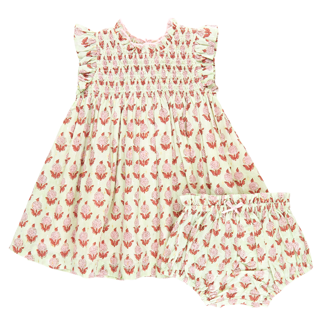 light green sleeveless smocked ruffle dress with pink and red block print