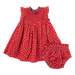 red sleeveless dress with smocking at the chest and tiny white rose print and matching bloomers