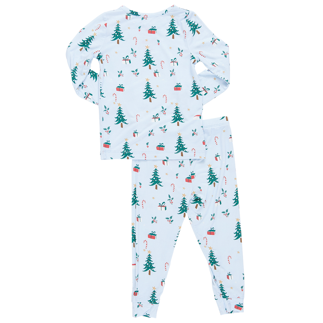 back of light blue long sleeve loungewear set with christmas trees, presents and candy cane print